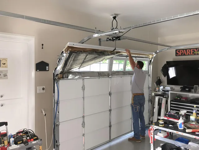 Garage door section replacement by Wrentham Garage Door Repair in Wrentham
