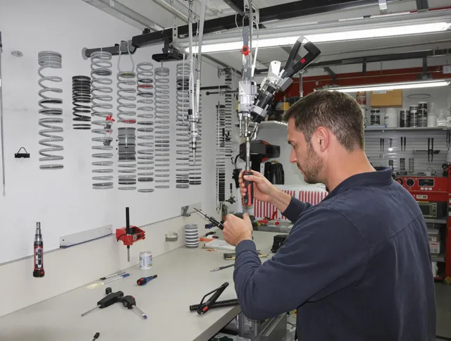 Wrentham Garage Door Repair safety certified technician performing precision spring replacement in Wrentham