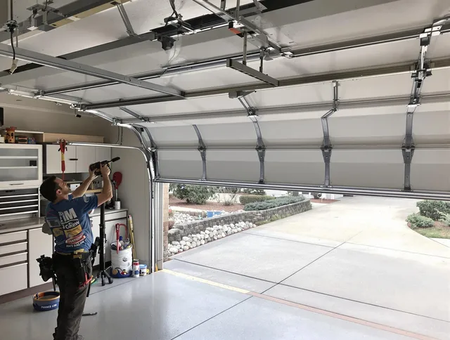 Garage door track repair service by Wrentham Garage Door Repair in Wrentham